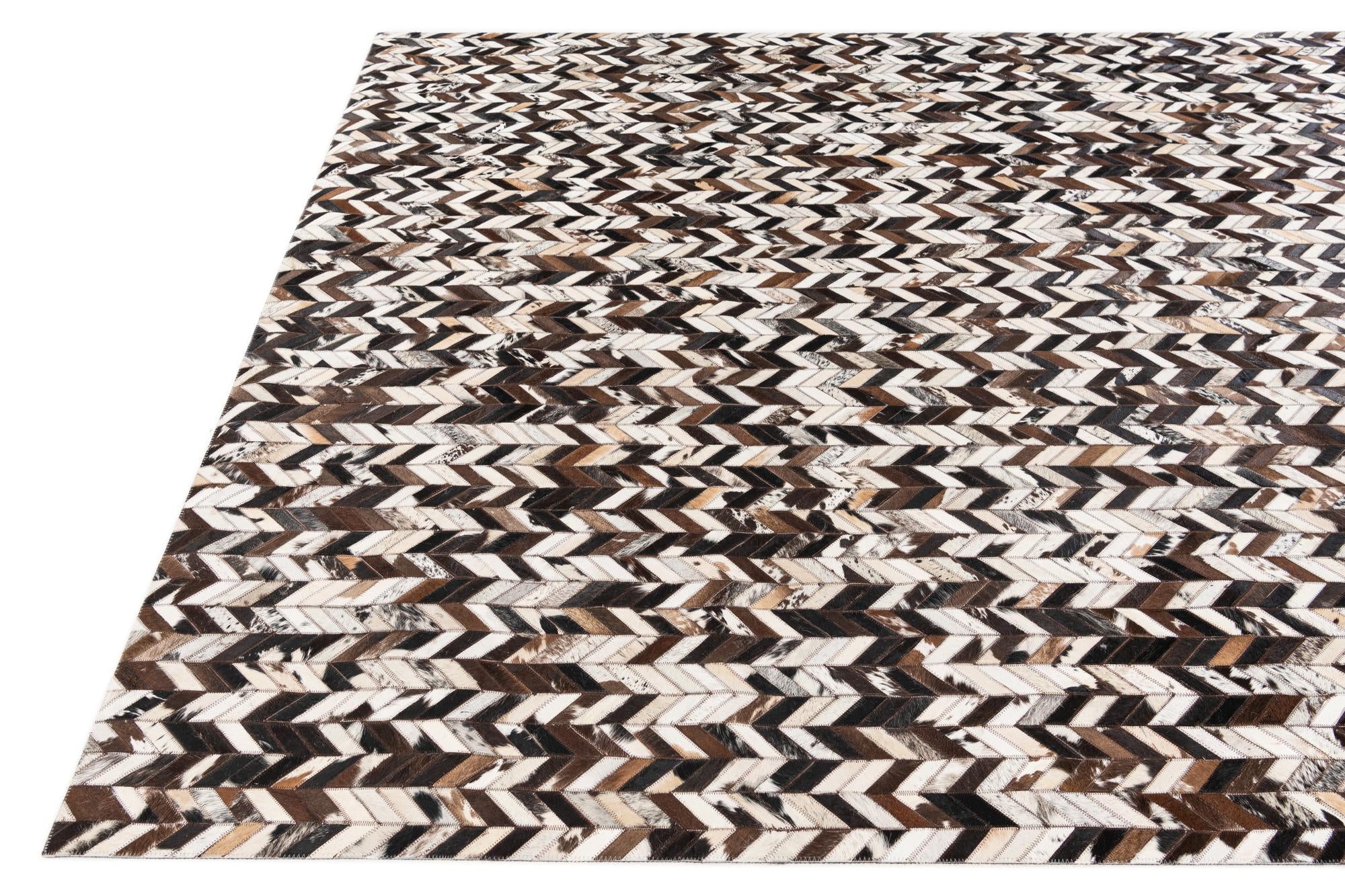 7' 7 x 9' 11 Cowhide Stocks Rug