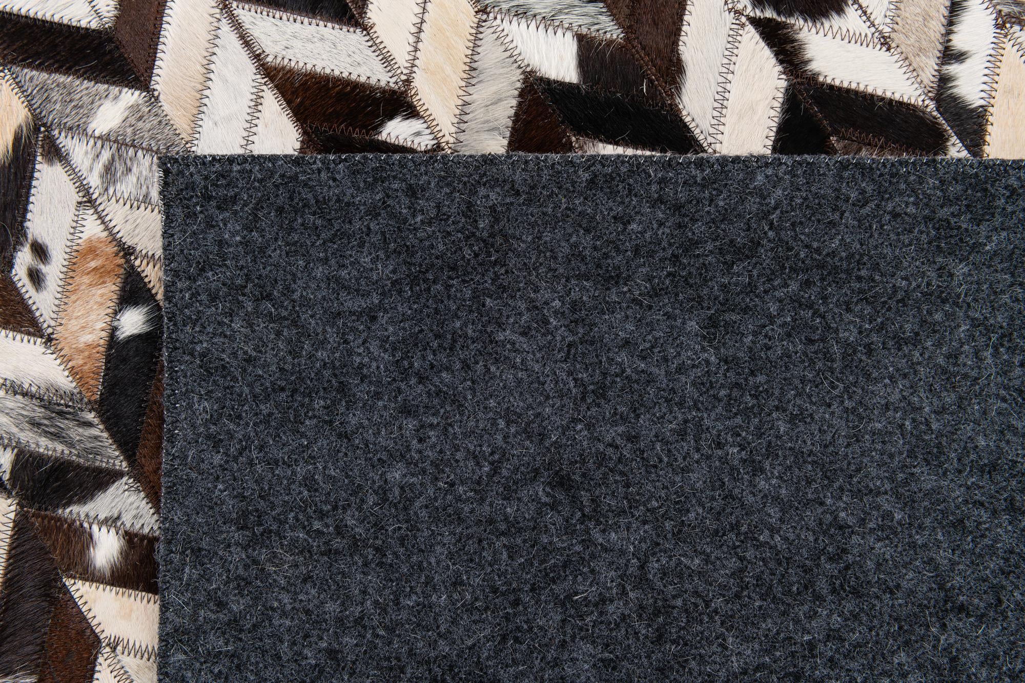 7' 7 x 9' 11 Cowhide Stocks Rug
