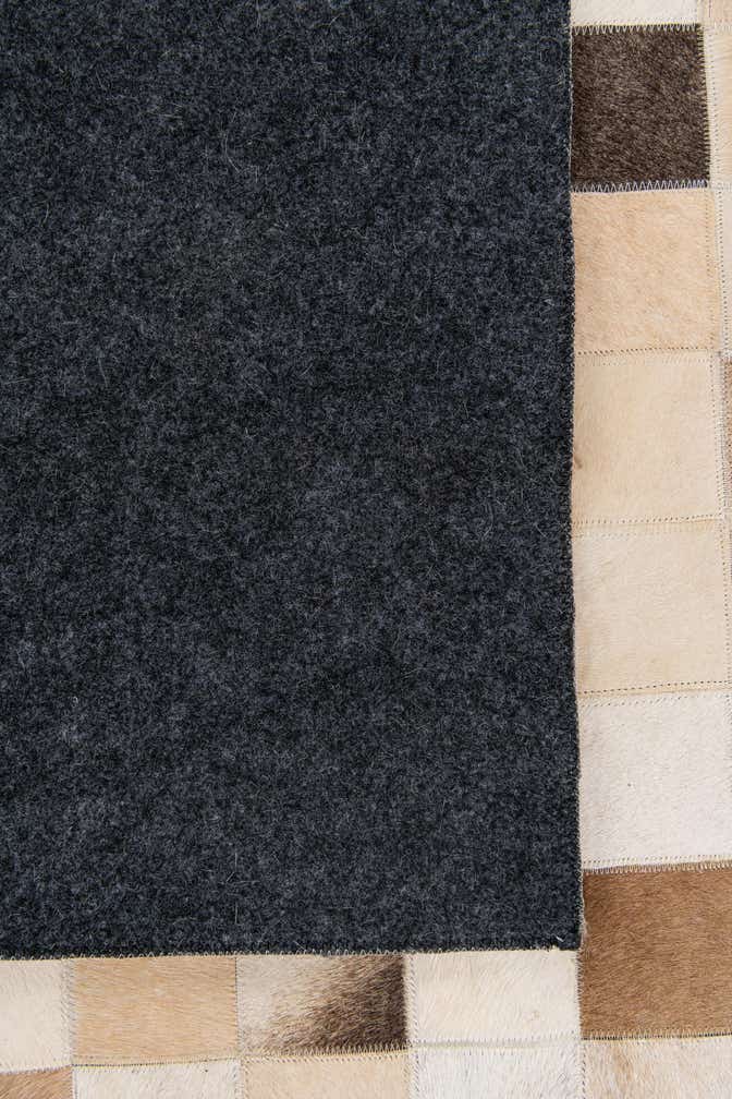 8' 1 x 9' 9 Cowhide Stocks Rug