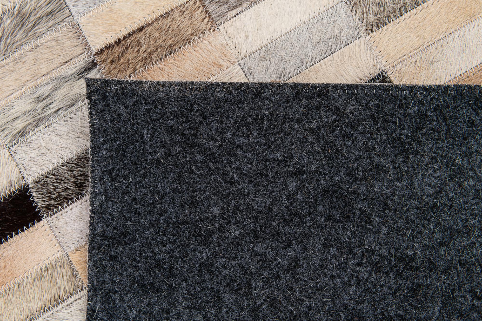 7' 11 x 9' 10 Cowhide Stocks Rug