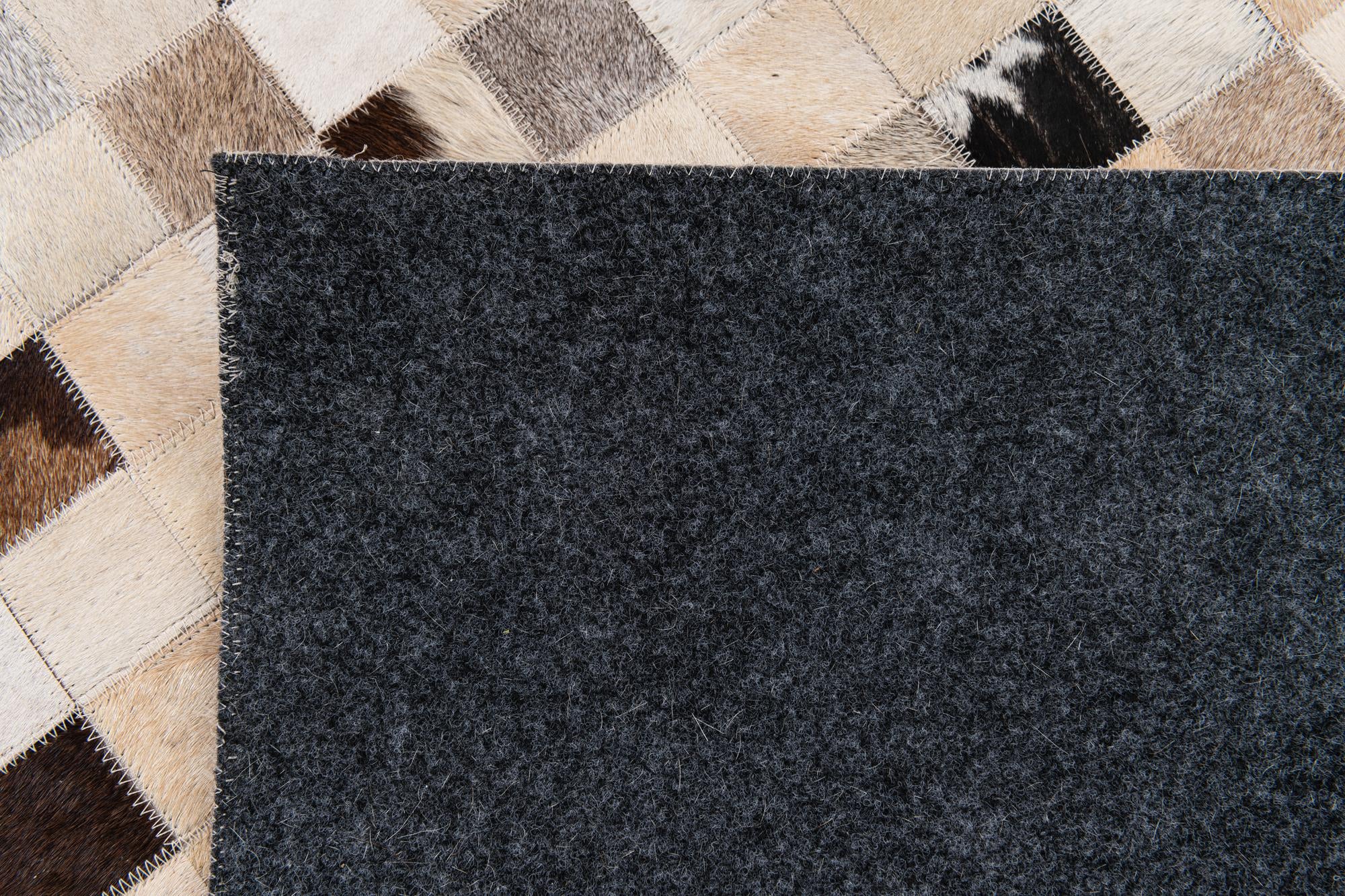 8' 1 x 9' 11 Cowhide Stocks Rug