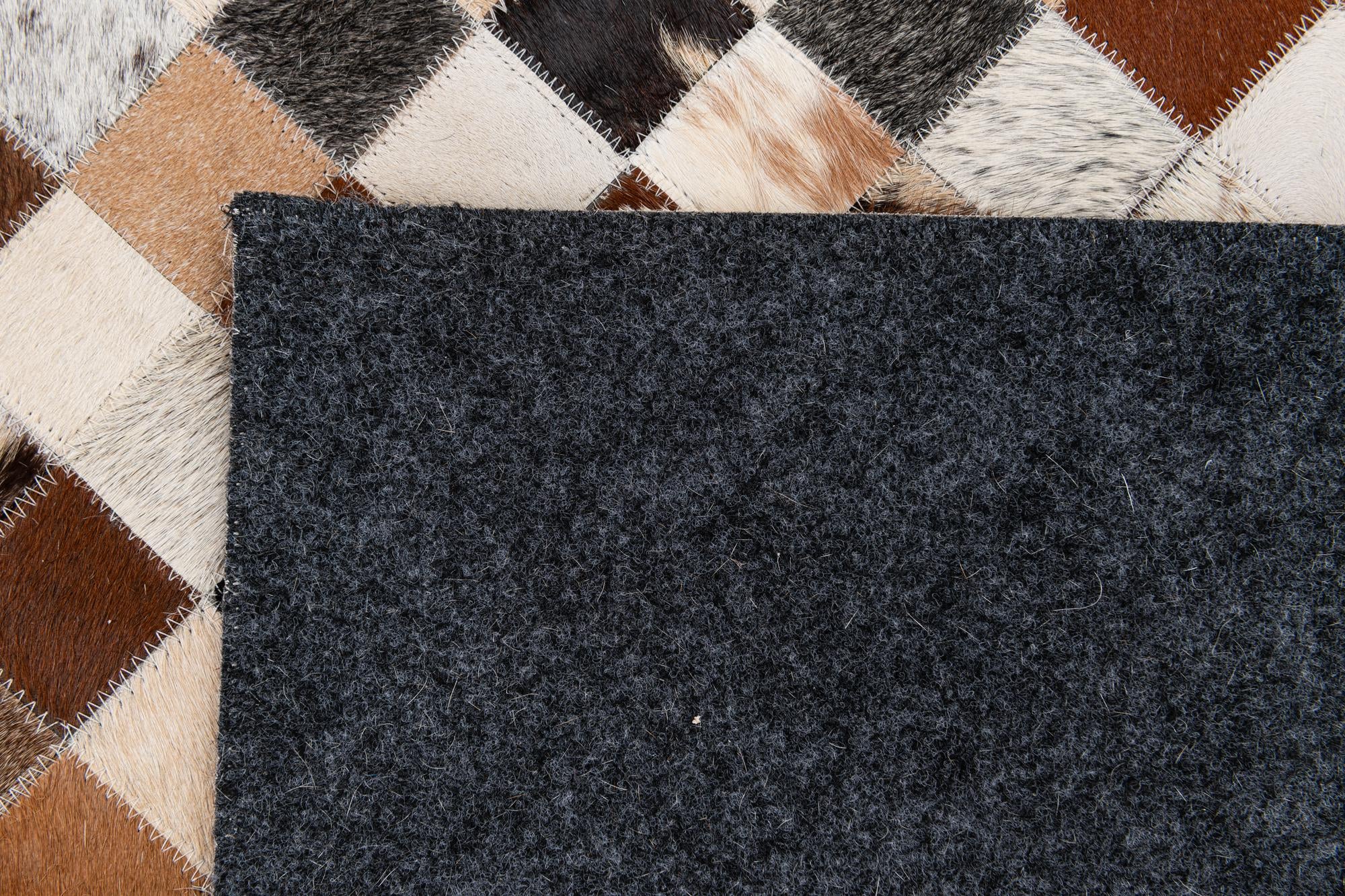 7' 11 x 9' 9 Cowhide Stocks Rug