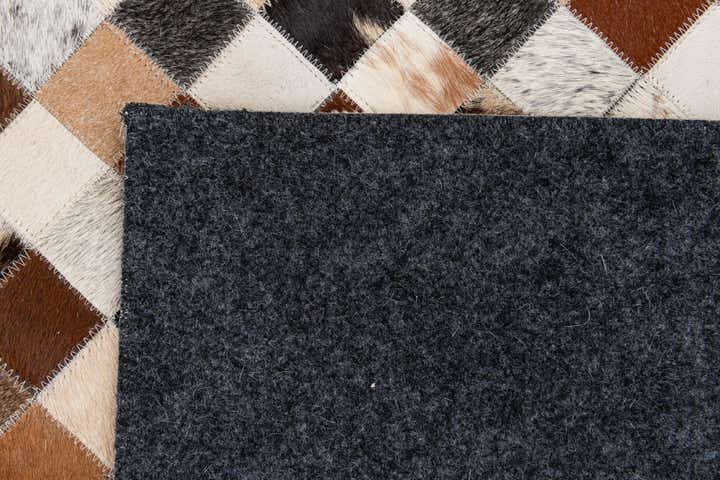 7' 11 x 9' 9 Cowhide Stocks Rug