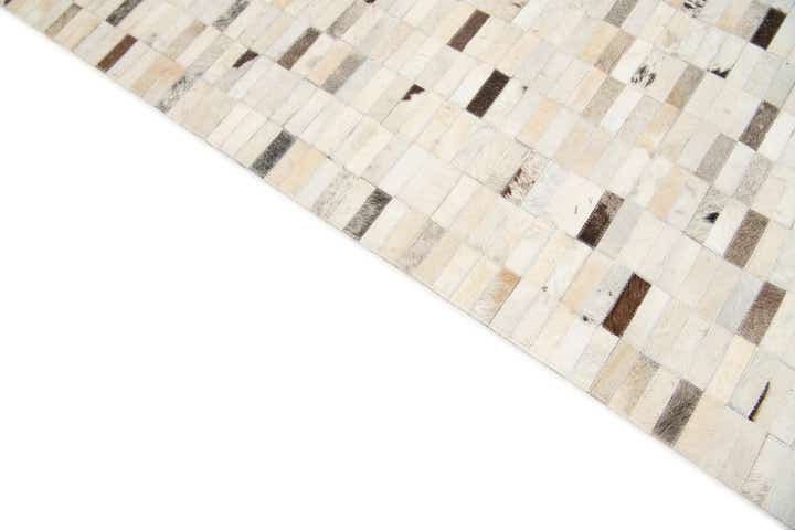 7' 11 x 9' 9 Cowhide Stocks Rug