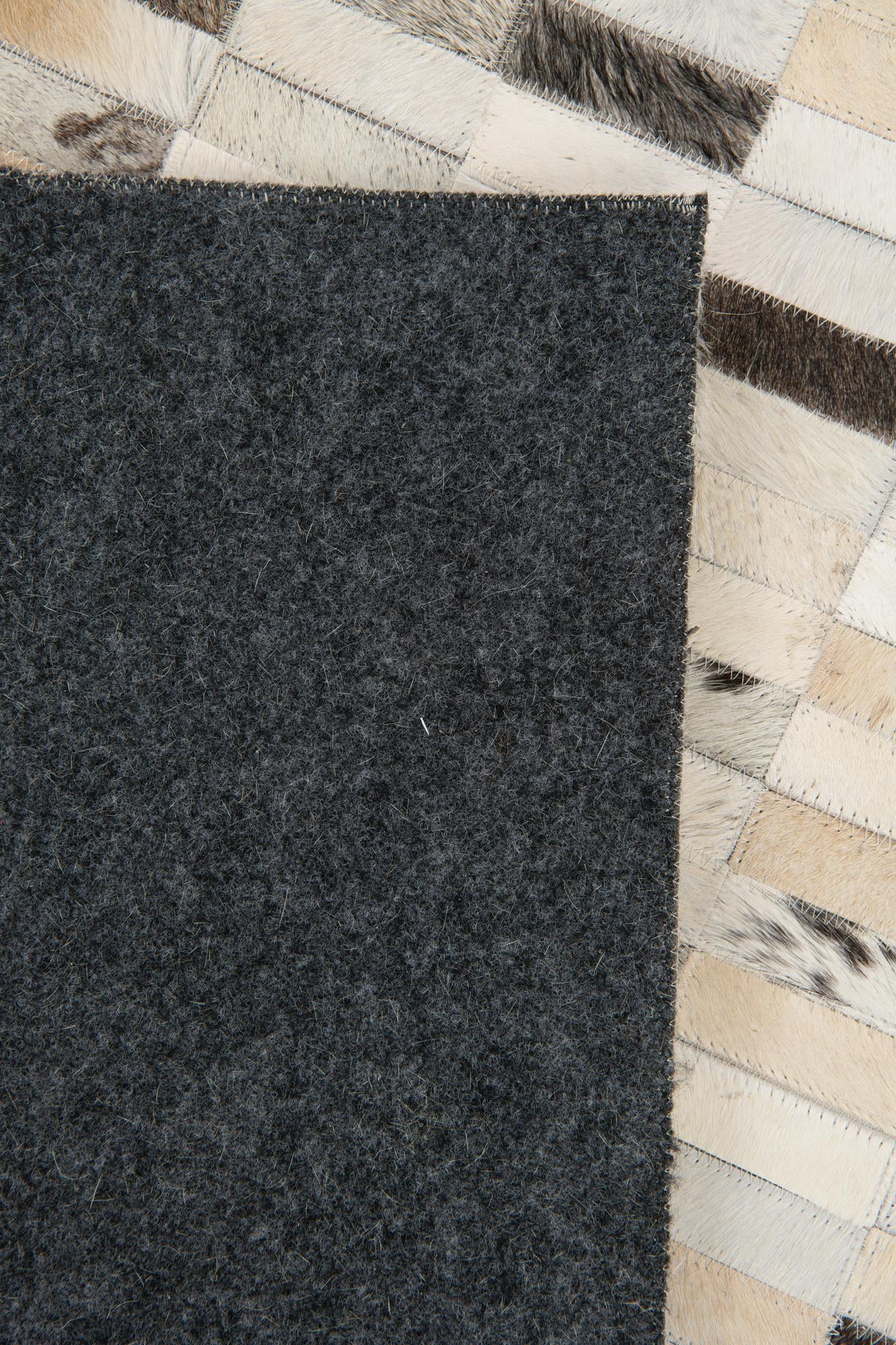 7' 11 x 9' 9 Cowhide Stocks Rug
