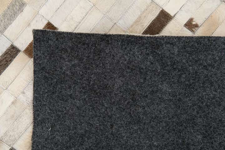 7' 11 x 9' 9 Cowhide Stocks Rug