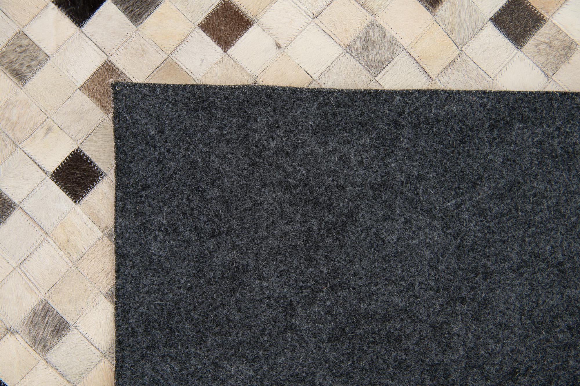 8' 1 x 9' 11 Cowhide Stocks Rug