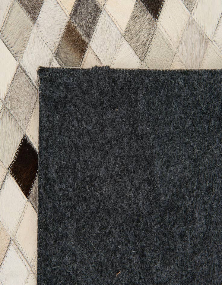 Detail image of 8' 1 x 9' 11 Cowhide Stocks Rug