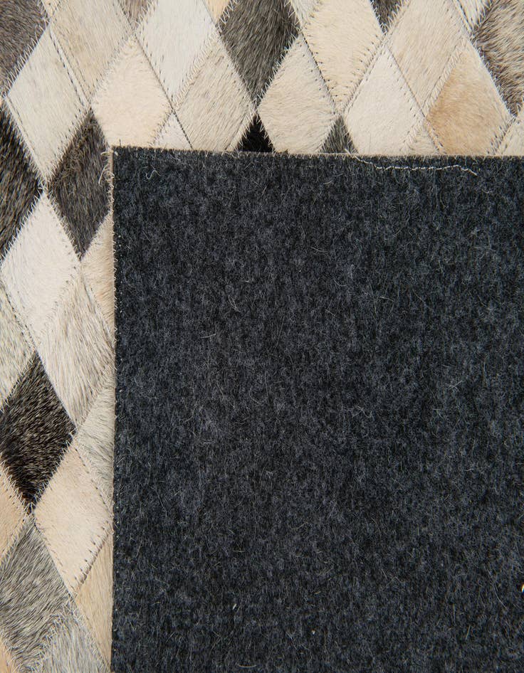 Detail image of 7' 11 x 9' 10 Cowhide Stocks Rug