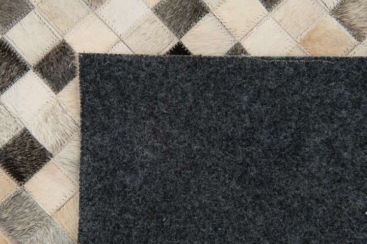 7' 11 x 9' 10 Cowhide Stocks Rug