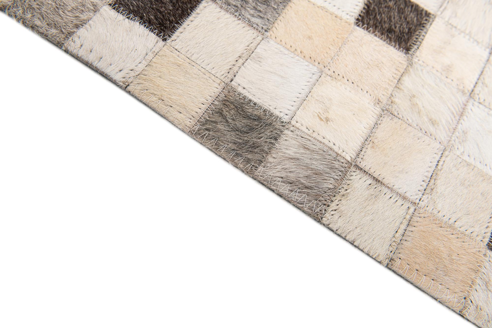 8' 1 x 9' 11 Cowhide Stocks Rug