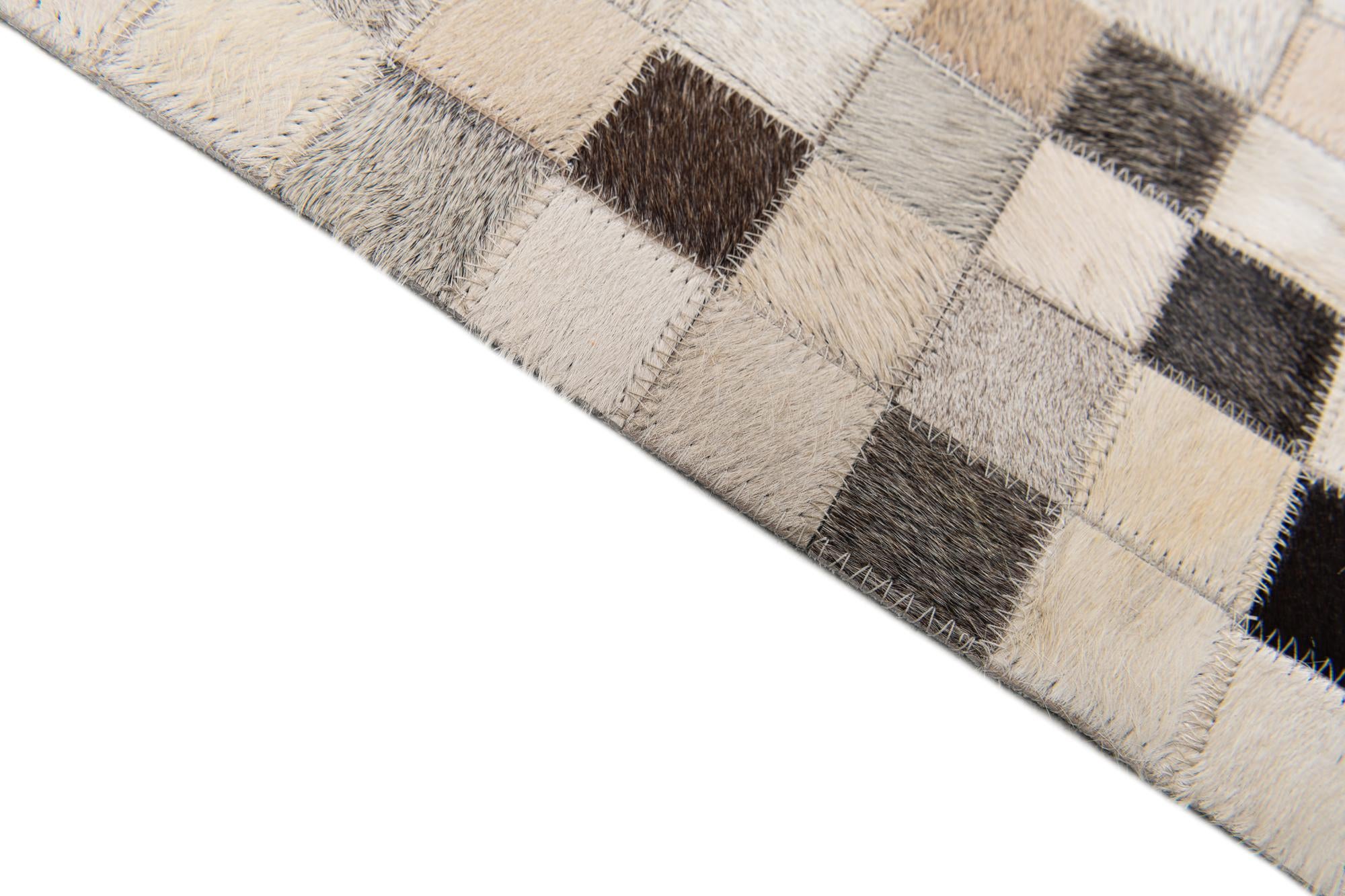 8' 1 x 9' 11 Cowhide Stocks Rug