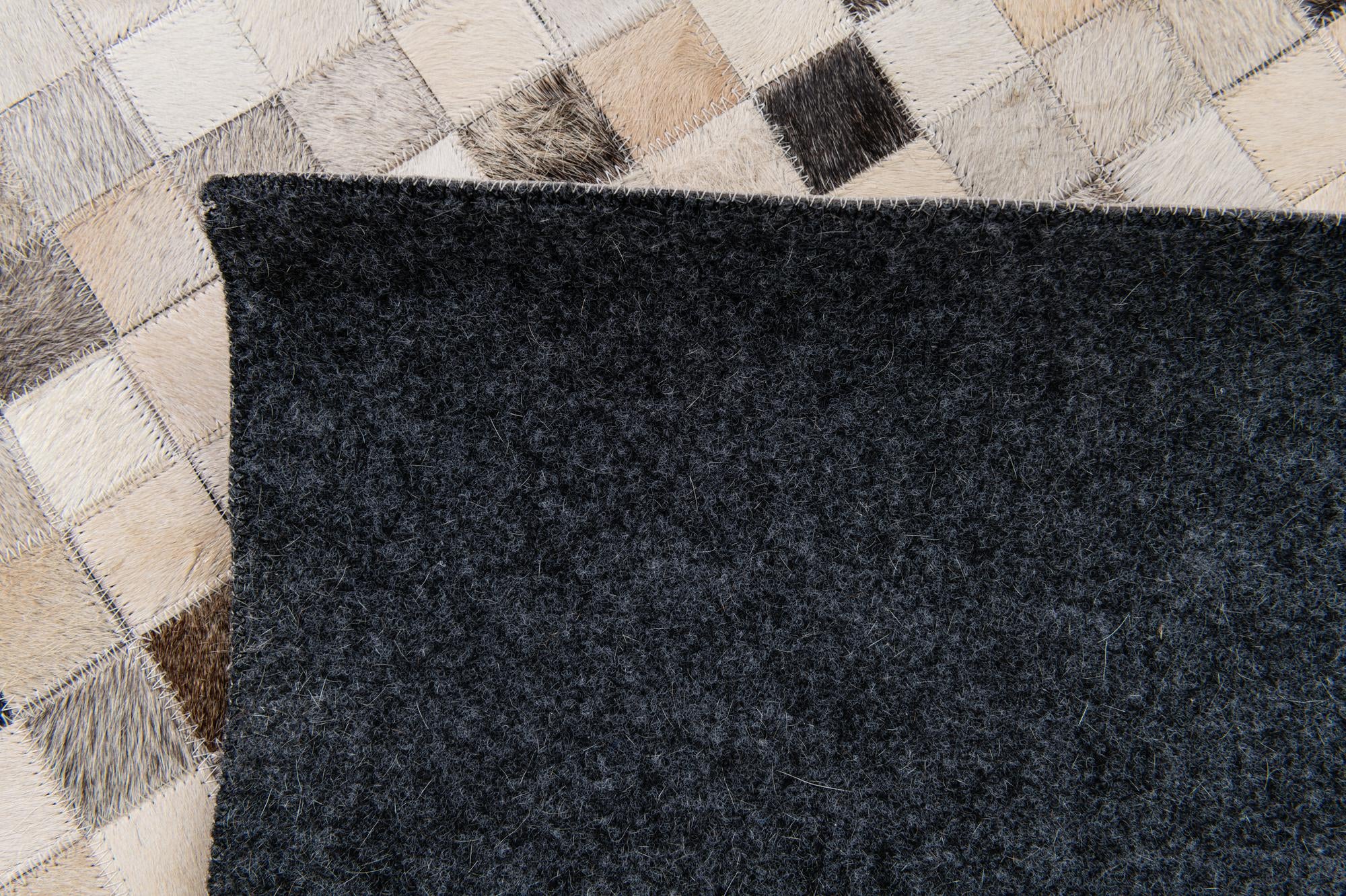 8' 1 x 9' 11 Cowhide Stocks Rug