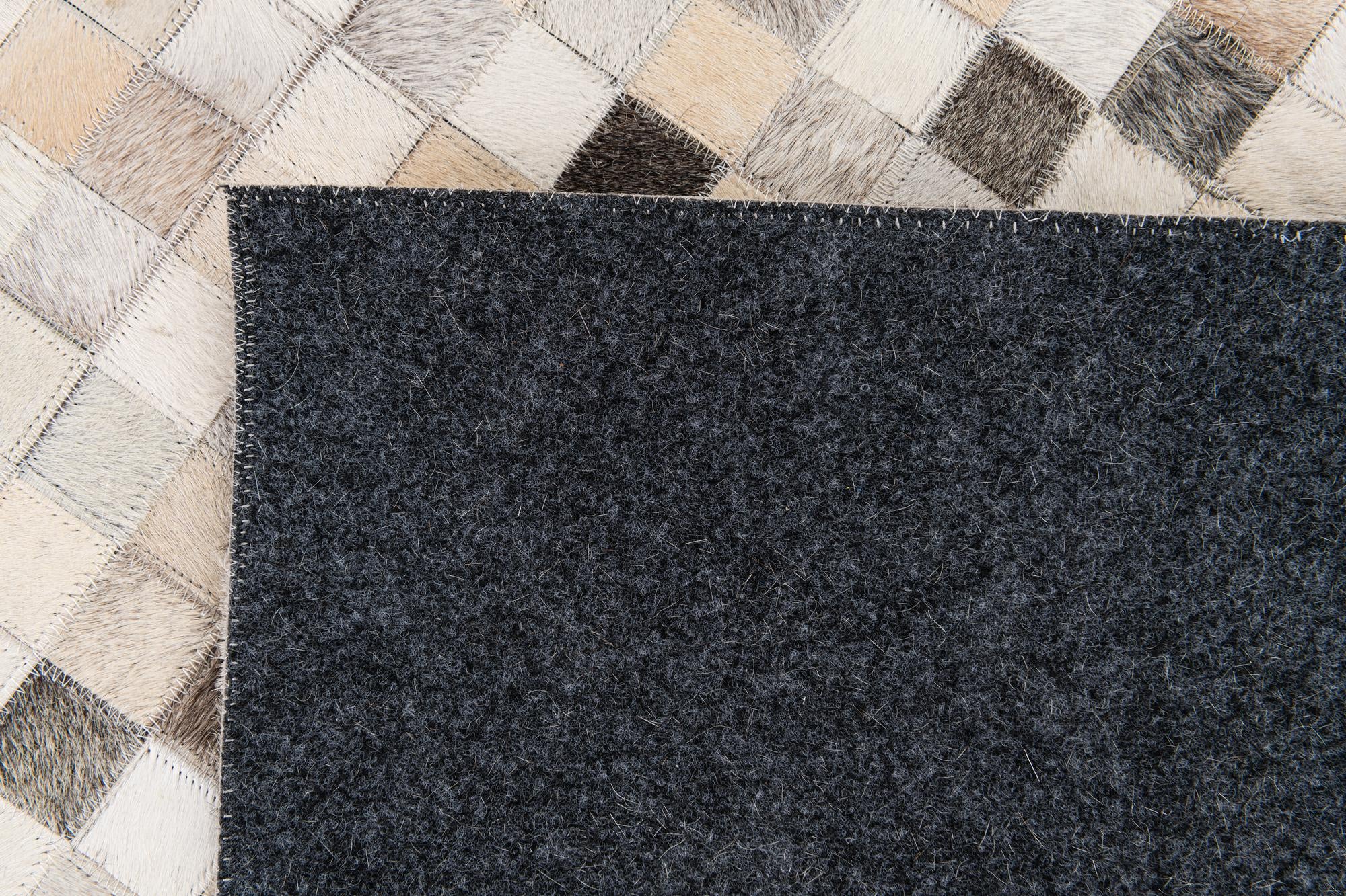 7' 11 x 9' 11 Cowhide Stocks Rug