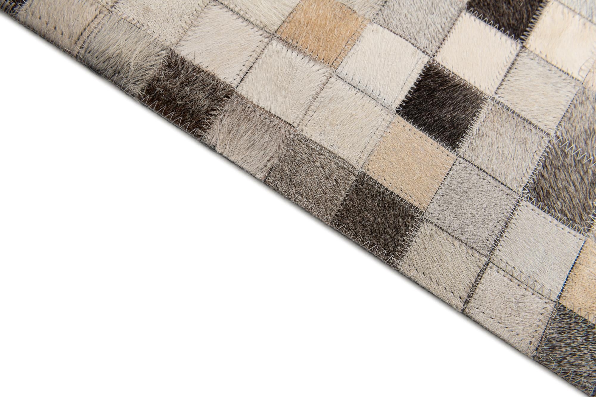 8' 1 x 9' 11 Cowhide Stocks Rug