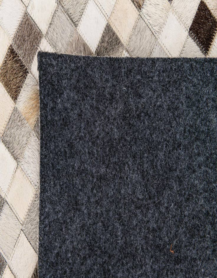 Detail image of 8' 1 x 9' 11 Cowhide Stocks Rug