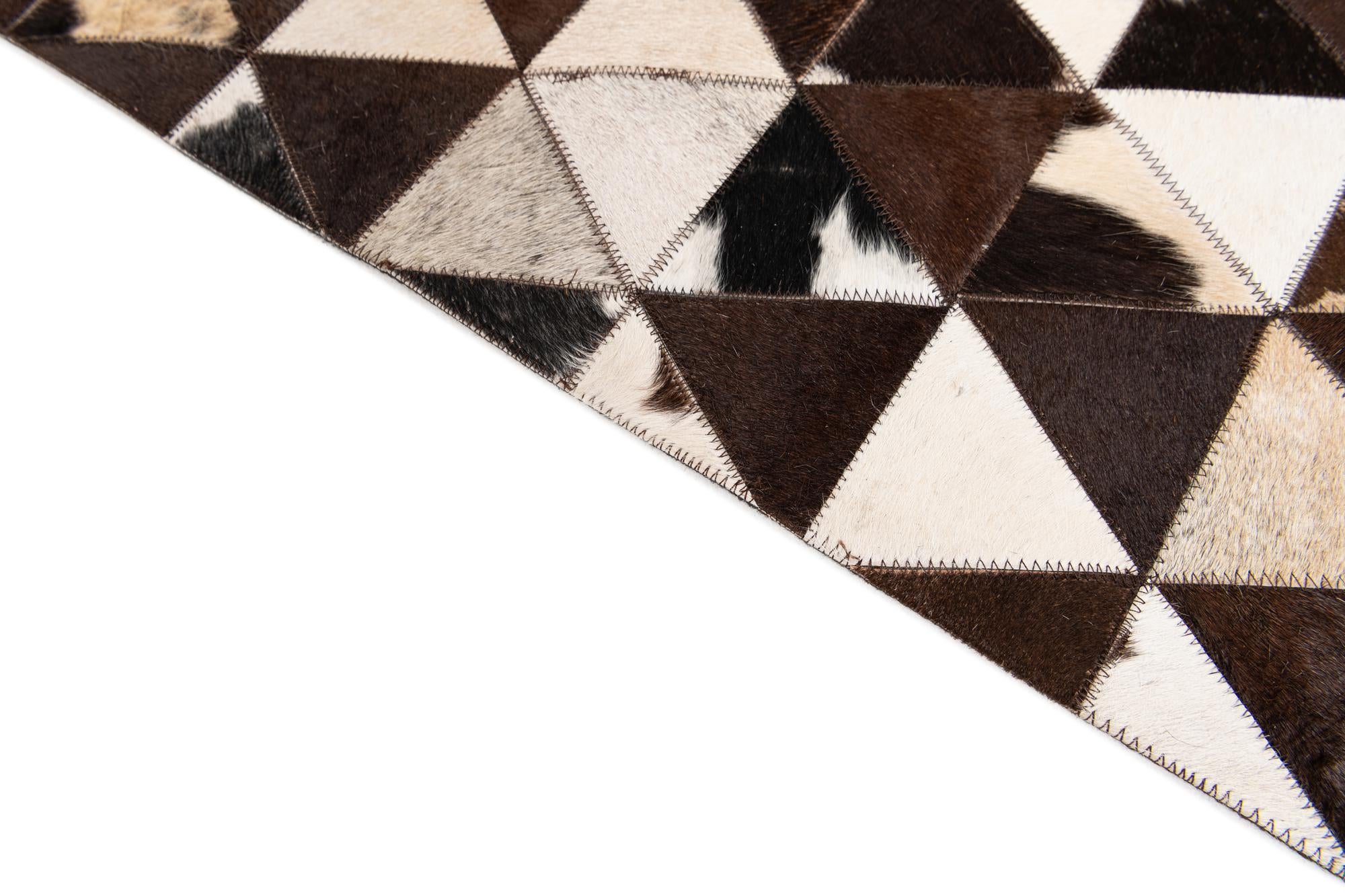 8' 1 x 10' 2 Cowhide Stocks Rug