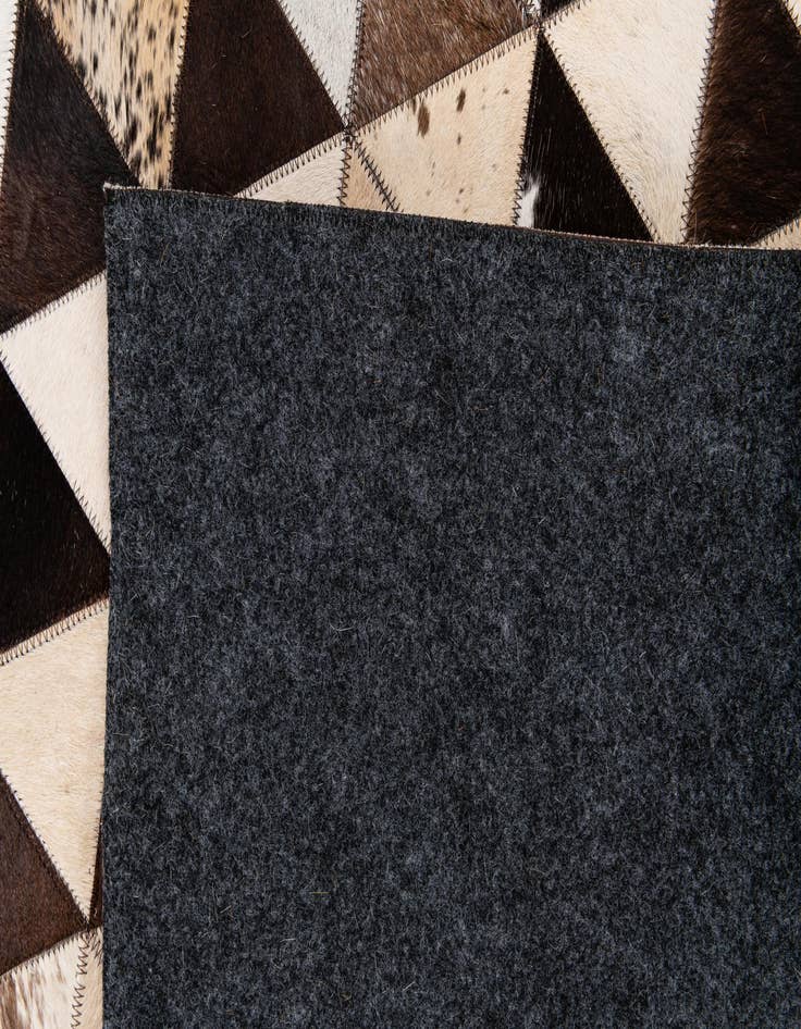 Detail image of 8' 1 x 10' 2 Cowhide Stocks Rug