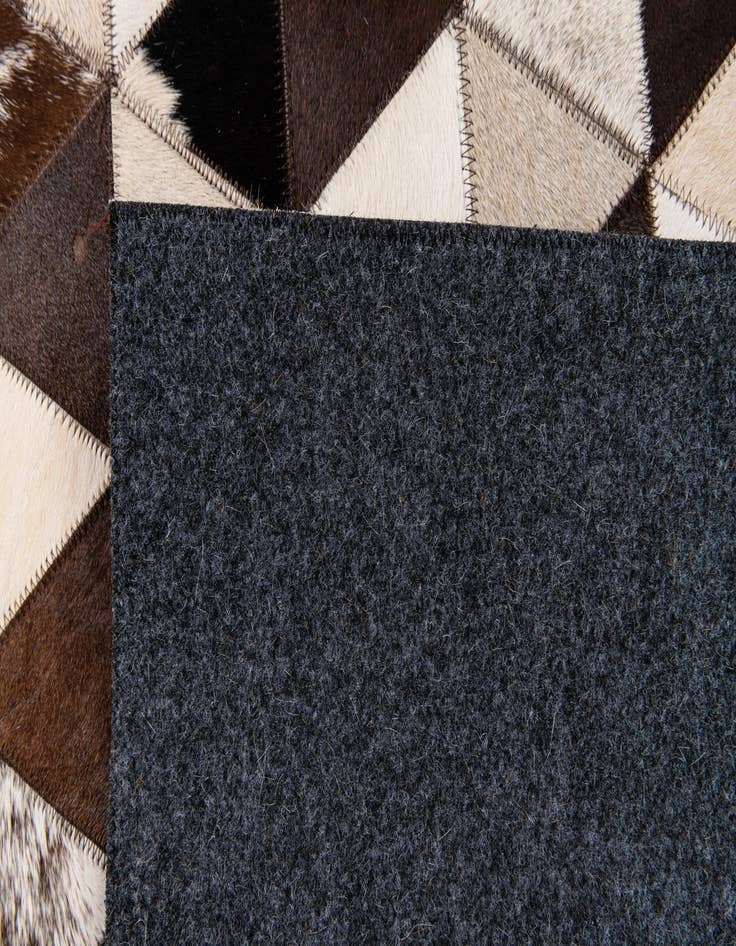 Detail image of 8' 1 x 10' 1 Cowhide Stocks Rug