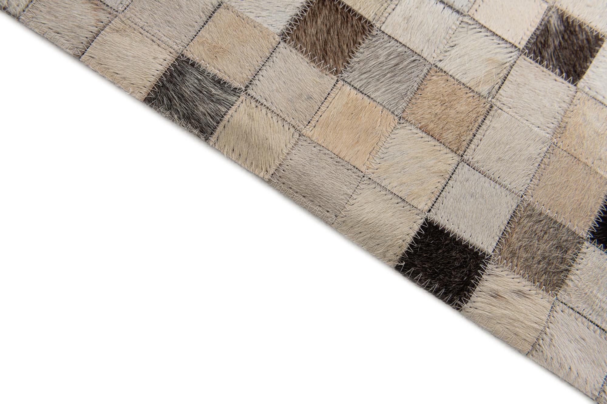 8' 1 x 9' 11 Cowhide Stocks Rug