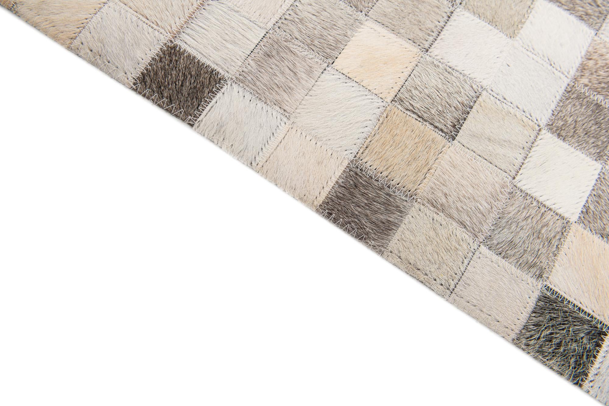 7' 11 x 9' 11 Cowhide Stocks Rug