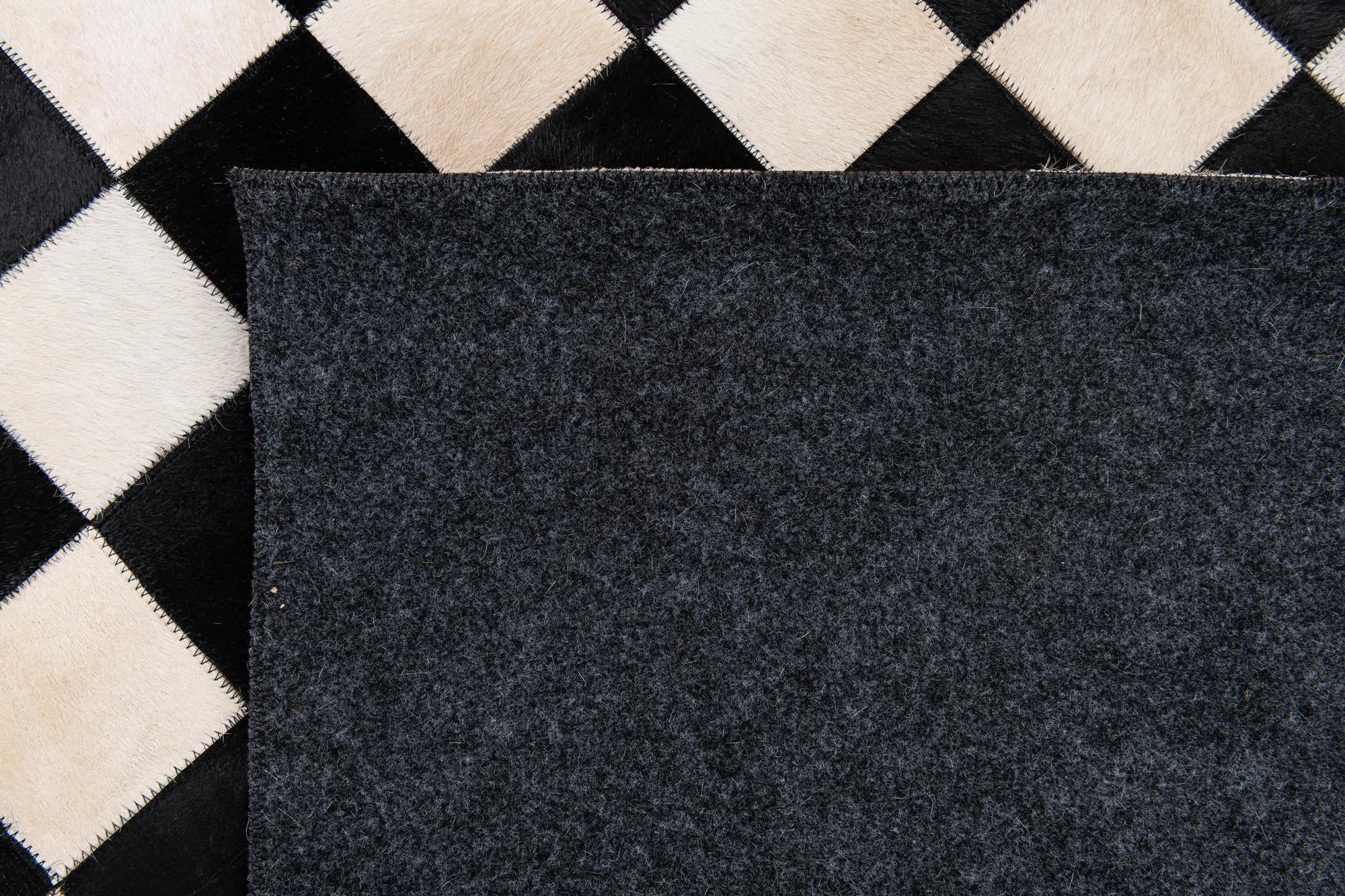 7' 11 x 9' 10 Cowhide Stocks Rug