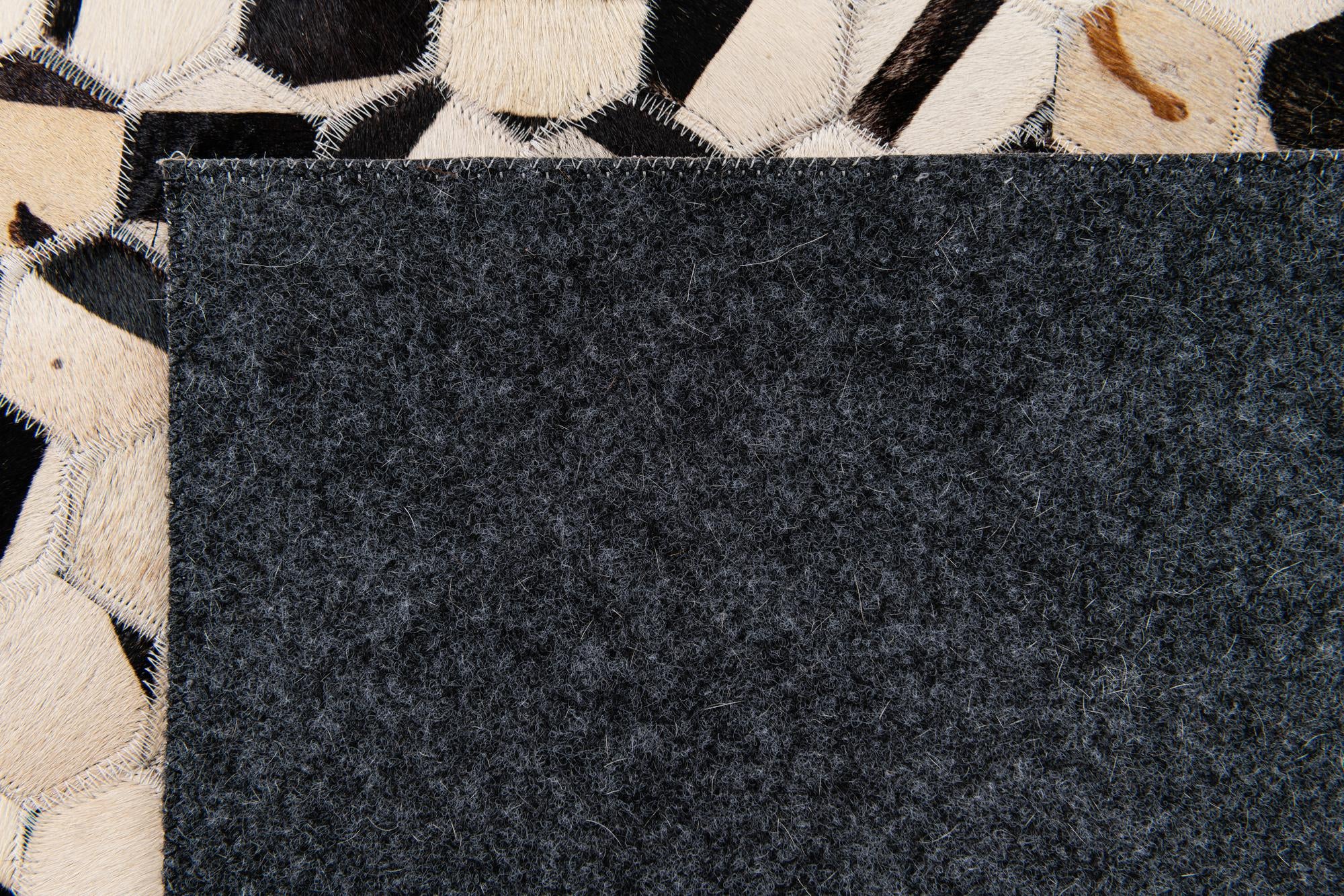 7' 11 x 9' 11 Cowhide Stocks Rug