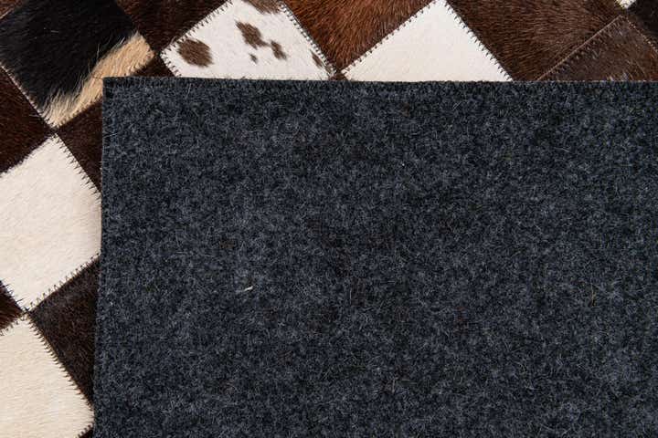 7' 11 x 9' 9 Cowhide Stocks Rug
