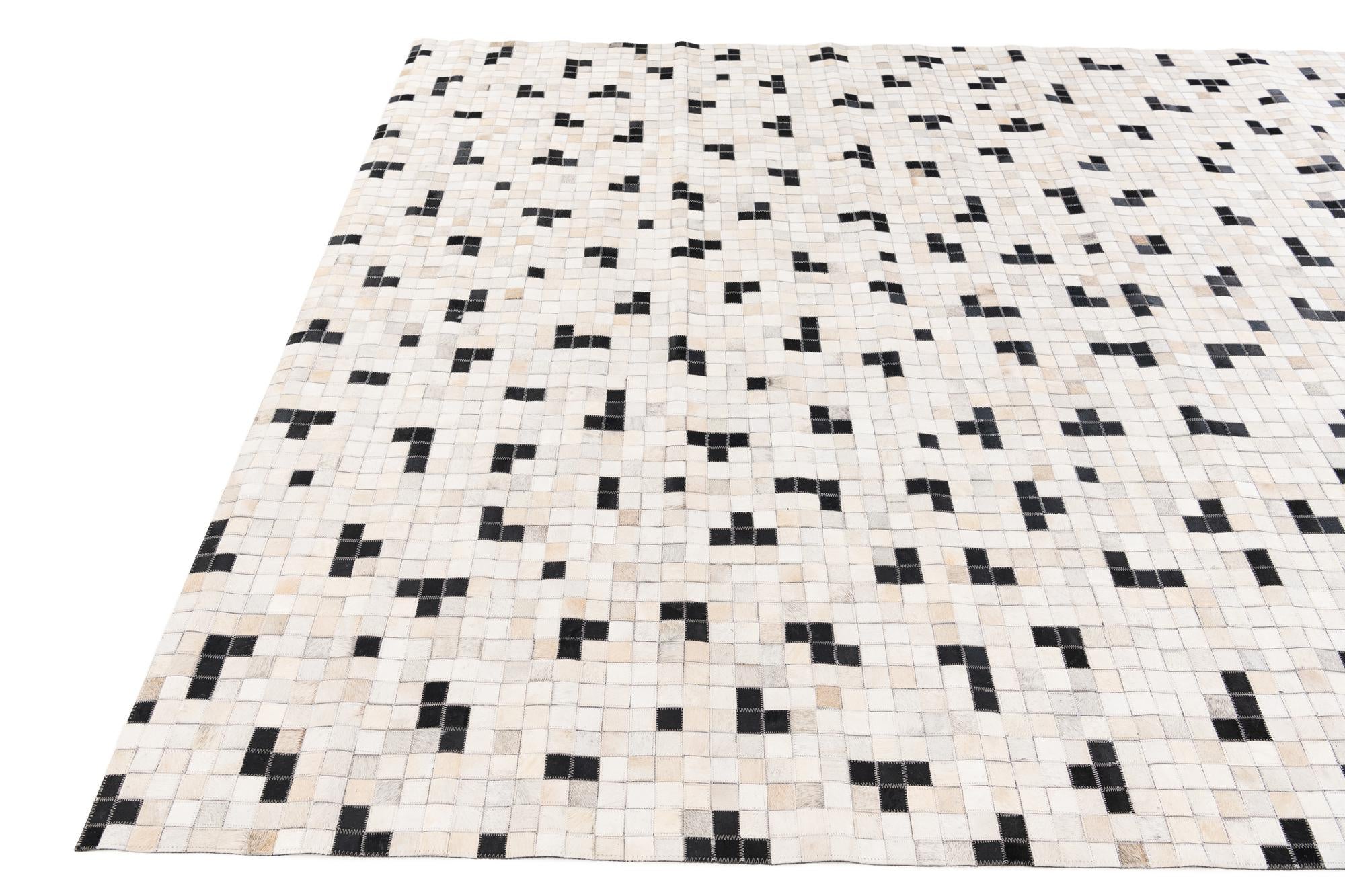 8' 1 x 9' 10 Cowhide Stocks Rug