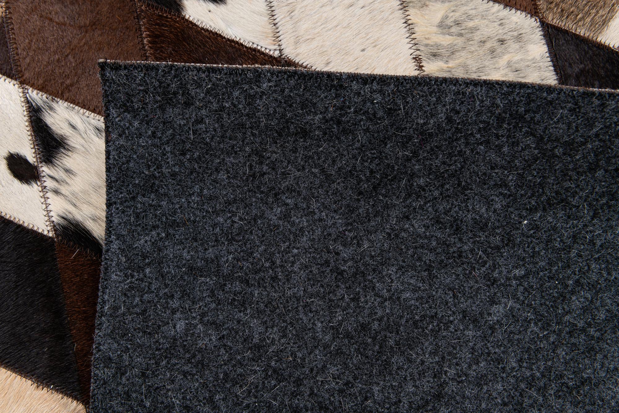 8' 1 x 10' 2 Cowhide Stocks Rug