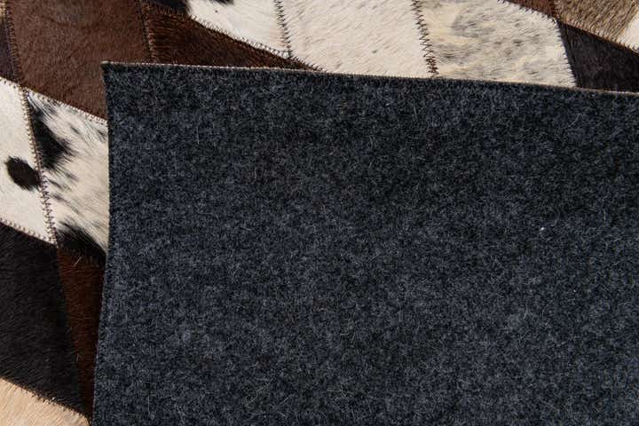 8' 1 x 10' 2 Cowhide Stocks Rug