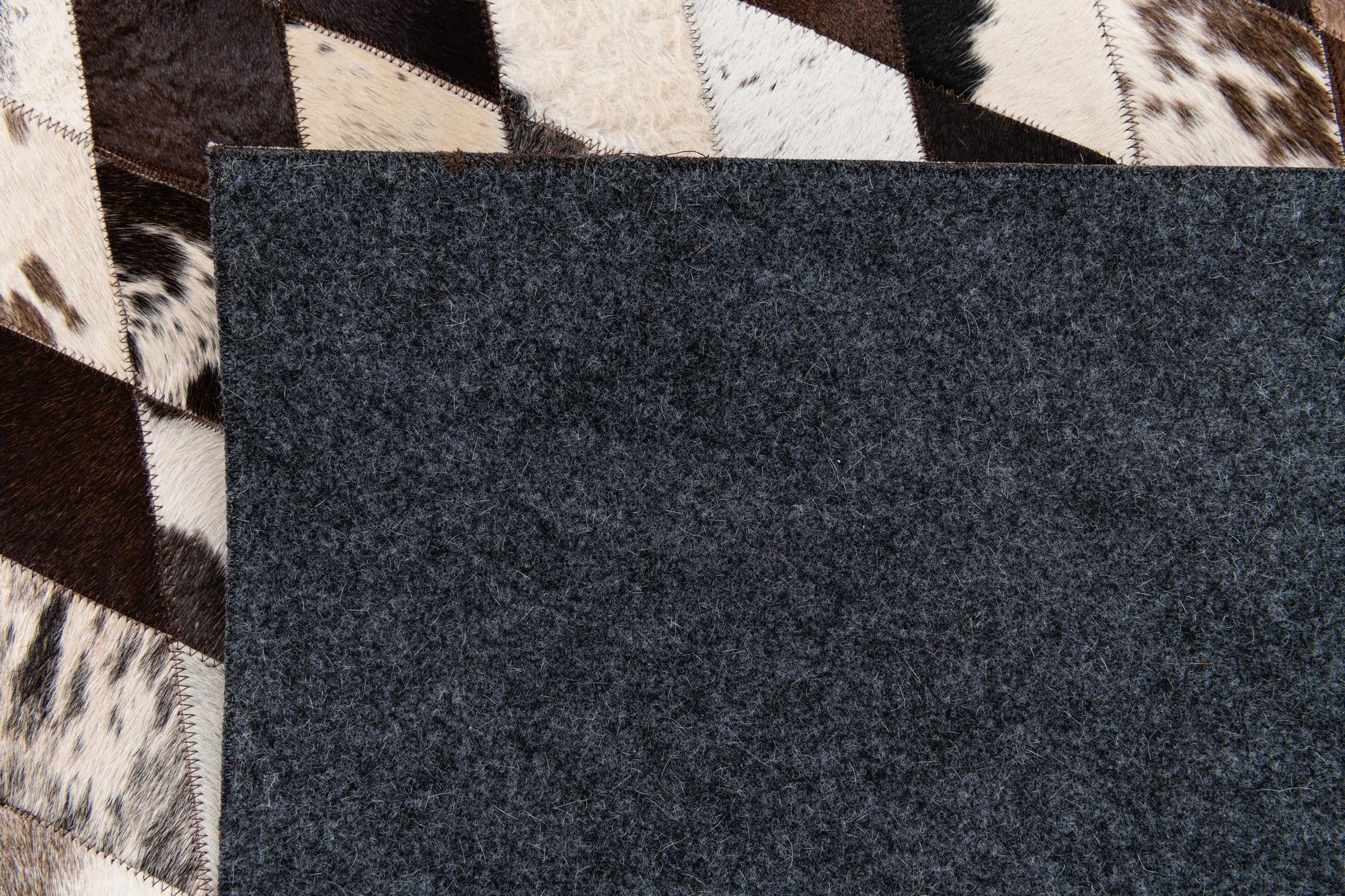 8' 1 x 10' 2 Cowhide Stocks Rug