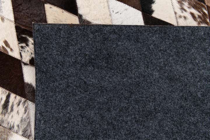 8' 1 x 10' 2 Cowhide Stocks Rug