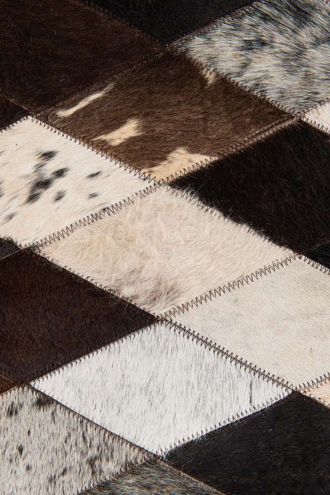 8' 1 x 10' 1 Cowhide Stocks Rug