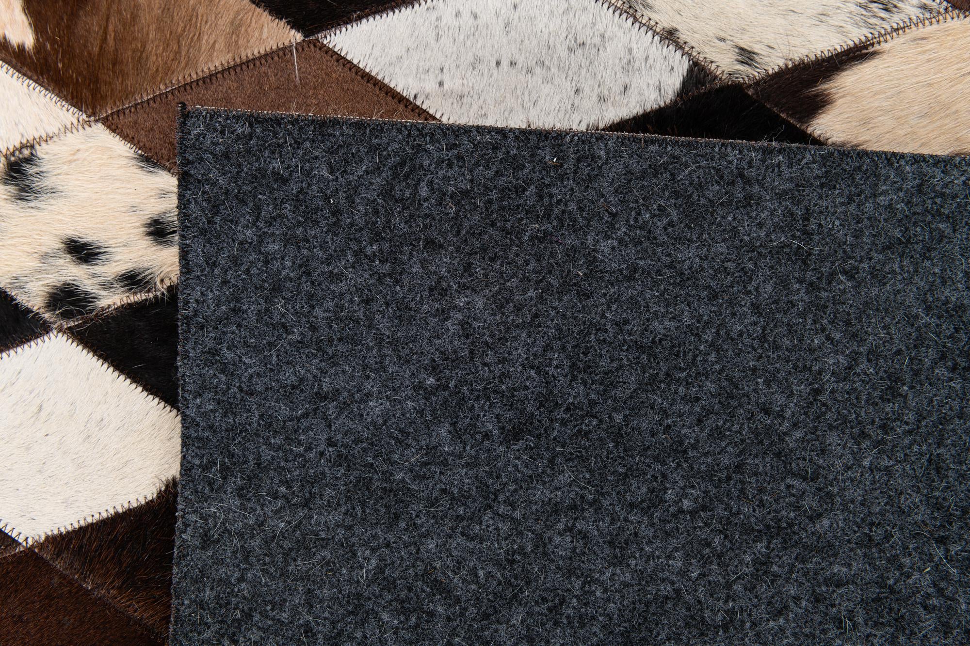 8' 1 x 10' 1 Cowhide Stocks Rug