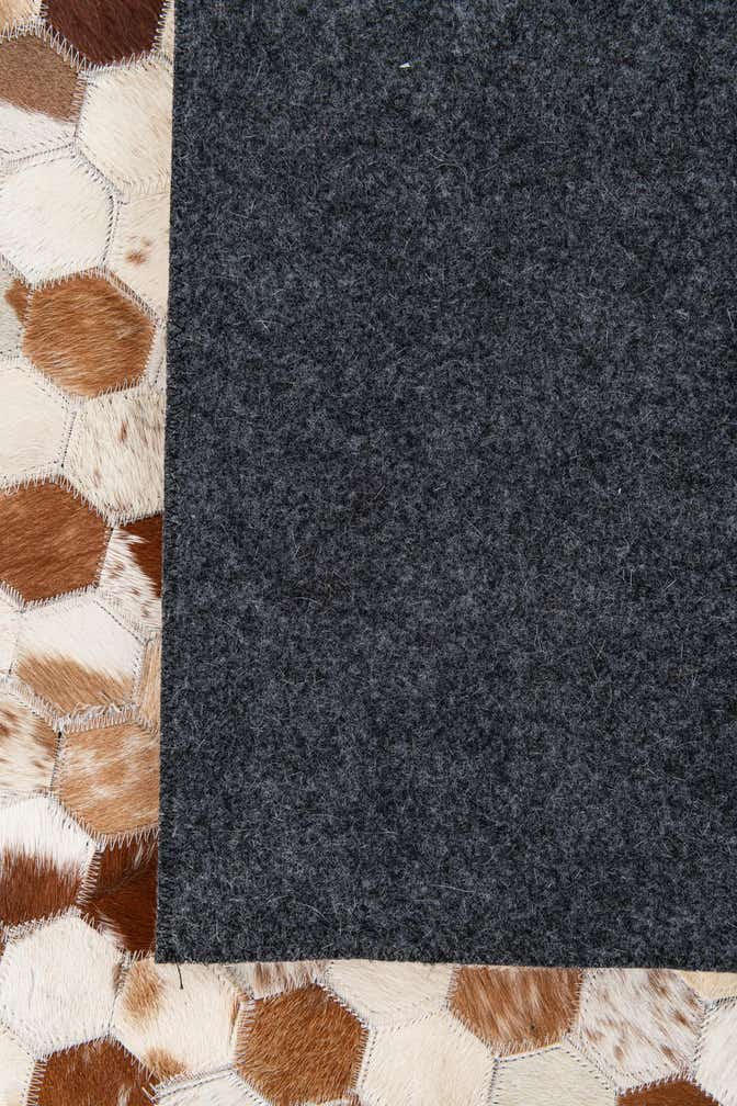 8' 1 x 9' 10 Cowhide Stocks Rug