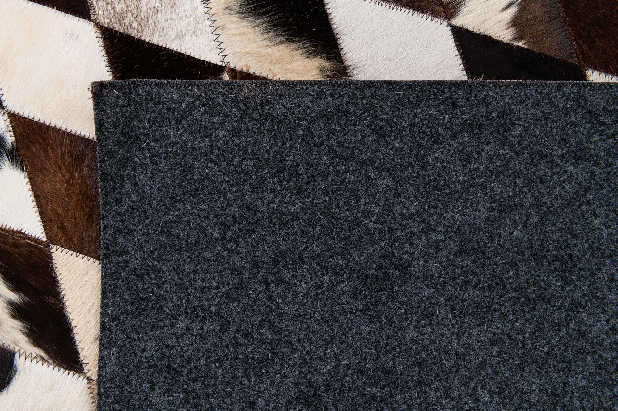 8' 1 x 10' 2 Cowhide Stocks Rug