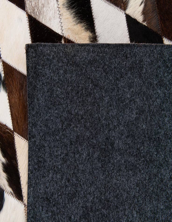 Detail image of 8' 1 x 10' 2 Cowhide Stocks Rug