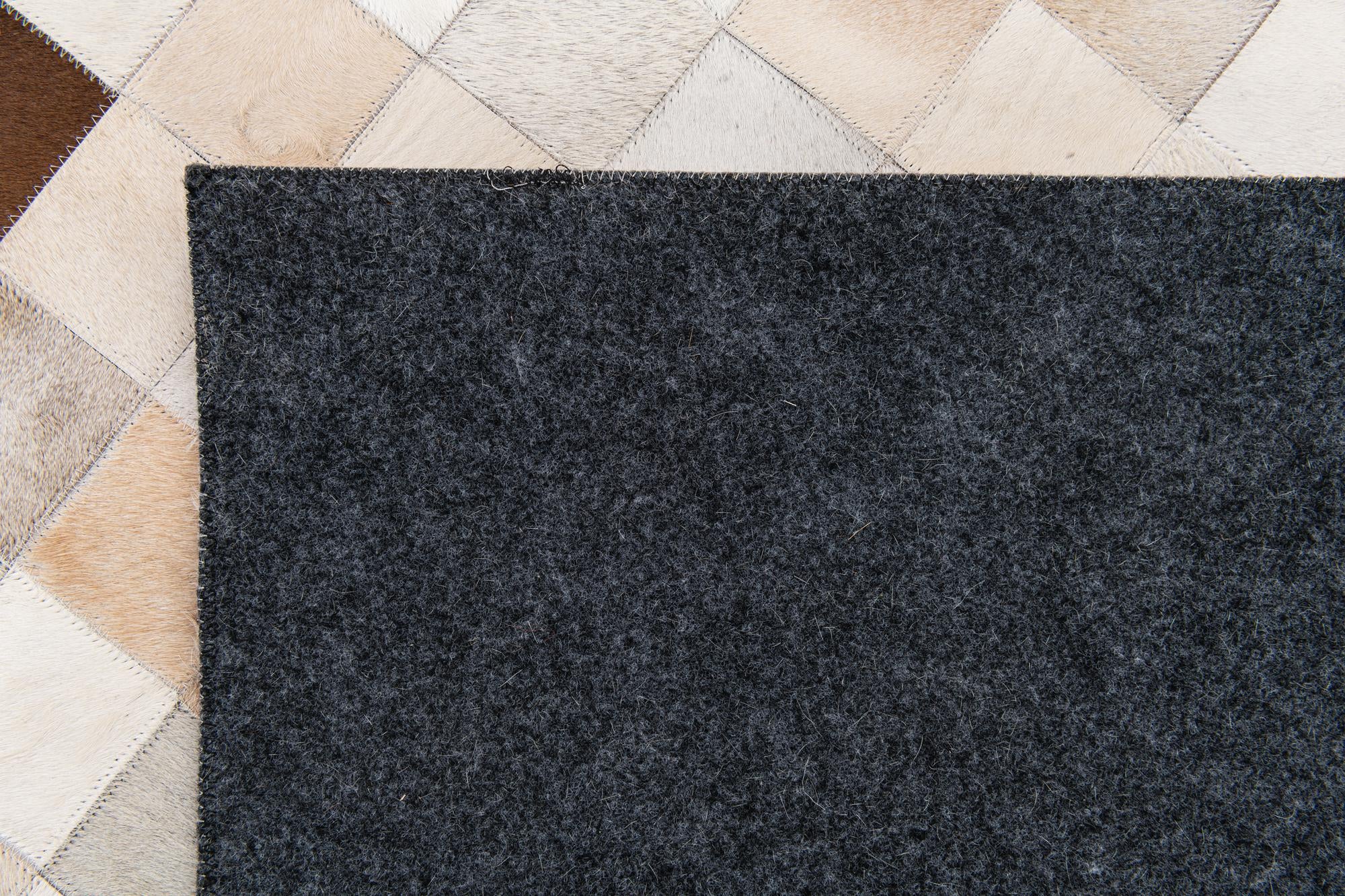 7' 11 x 9' 10 Cowhide Stocks Rug