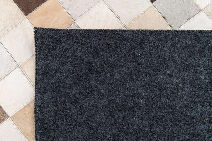 7' 11 x 9' 10 Cowhide Stocks Rug