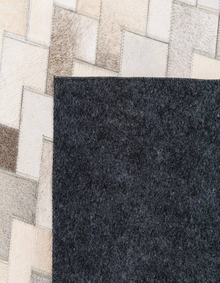 Detail image of 6' x 8' 11 Cowhide Stocks Rug