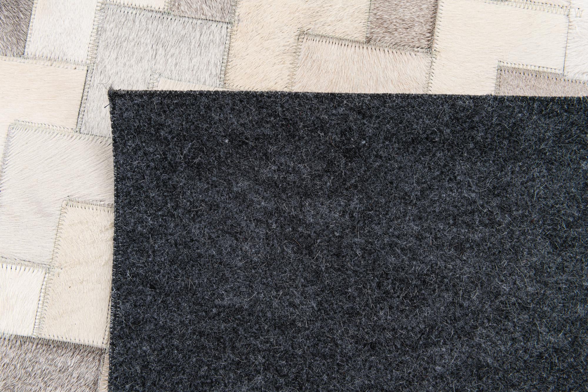 6' 1 x 9' Cowhide Stocks Rug