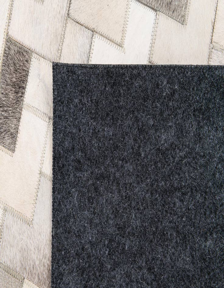 Detail image of 6' x 8' 11 Cowhide Stocks Rug