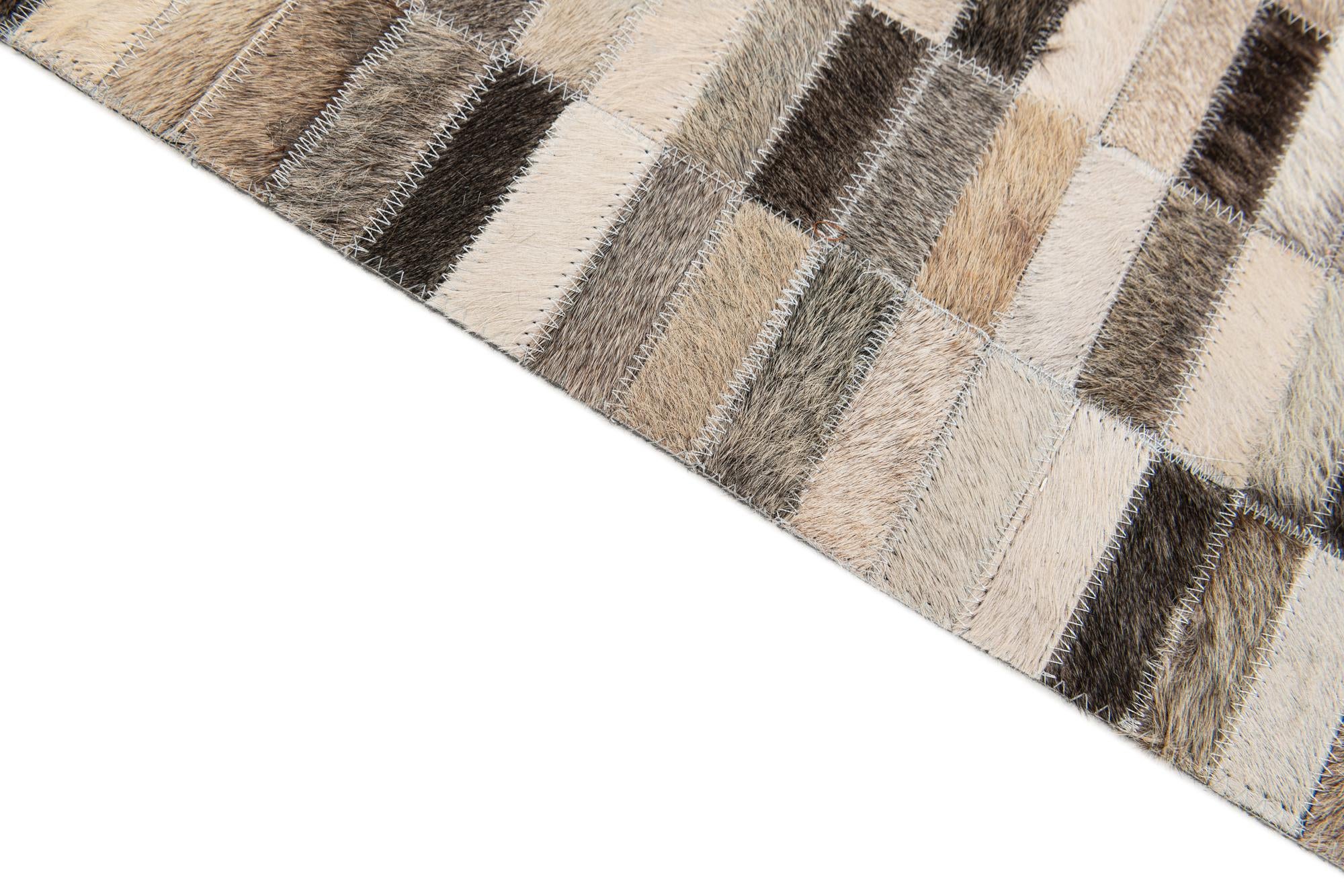 6' x 8' 11 Cowhide Stocks Rug