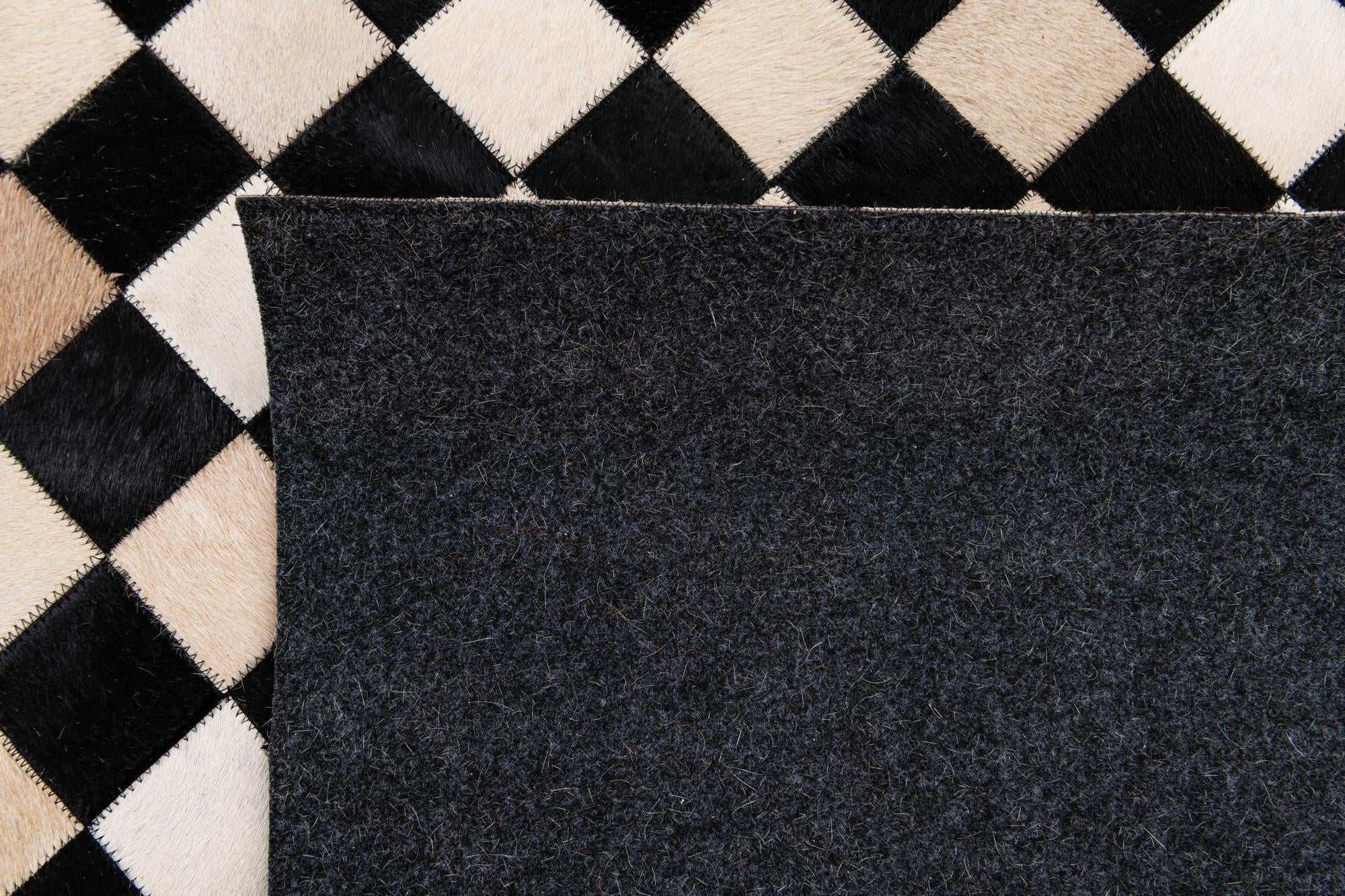 6' 8 x 9' 9 Cowhide Stocks Rug