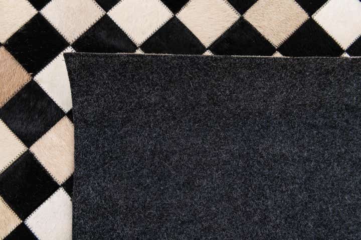 6' 8 x 9' 9 Cowhide Stocks Rug