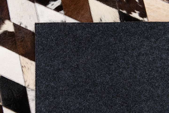6' 7 x 9' 11 Cowhide Stocks Rug