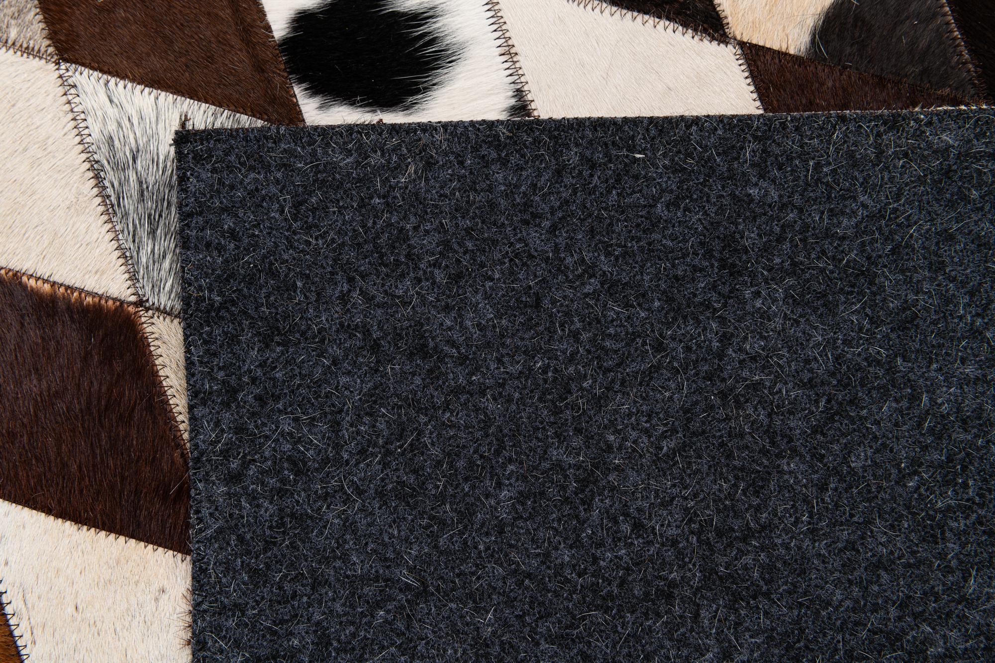 6' 7 x 9' 10 Cowhide Stocks Rug