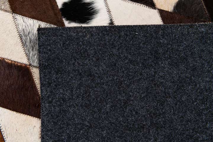 6' 7 x 9' 10 Cowhide Stocks Rug