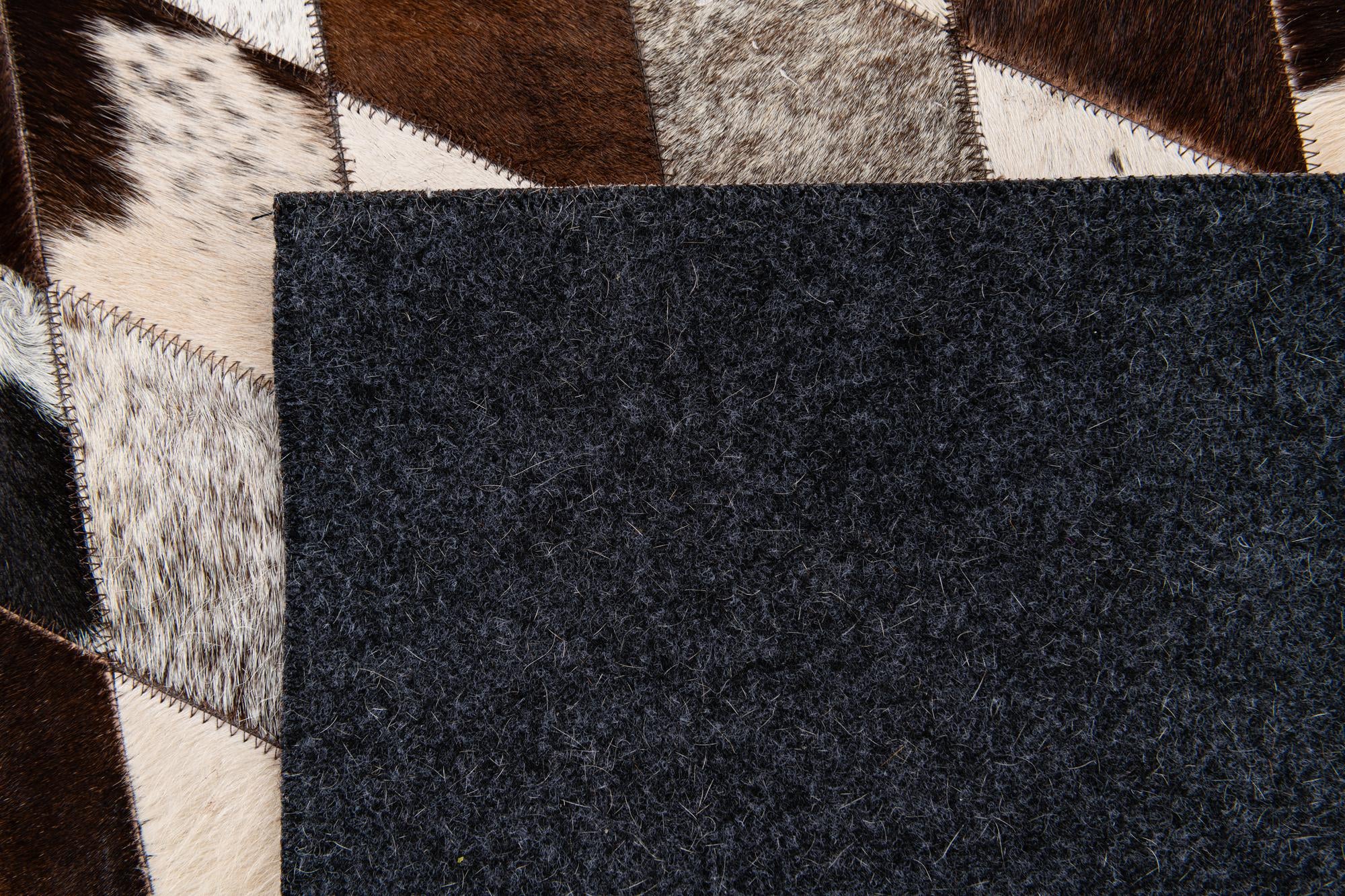 6' 7 x 9' 11 Cowhide Stocks Rug